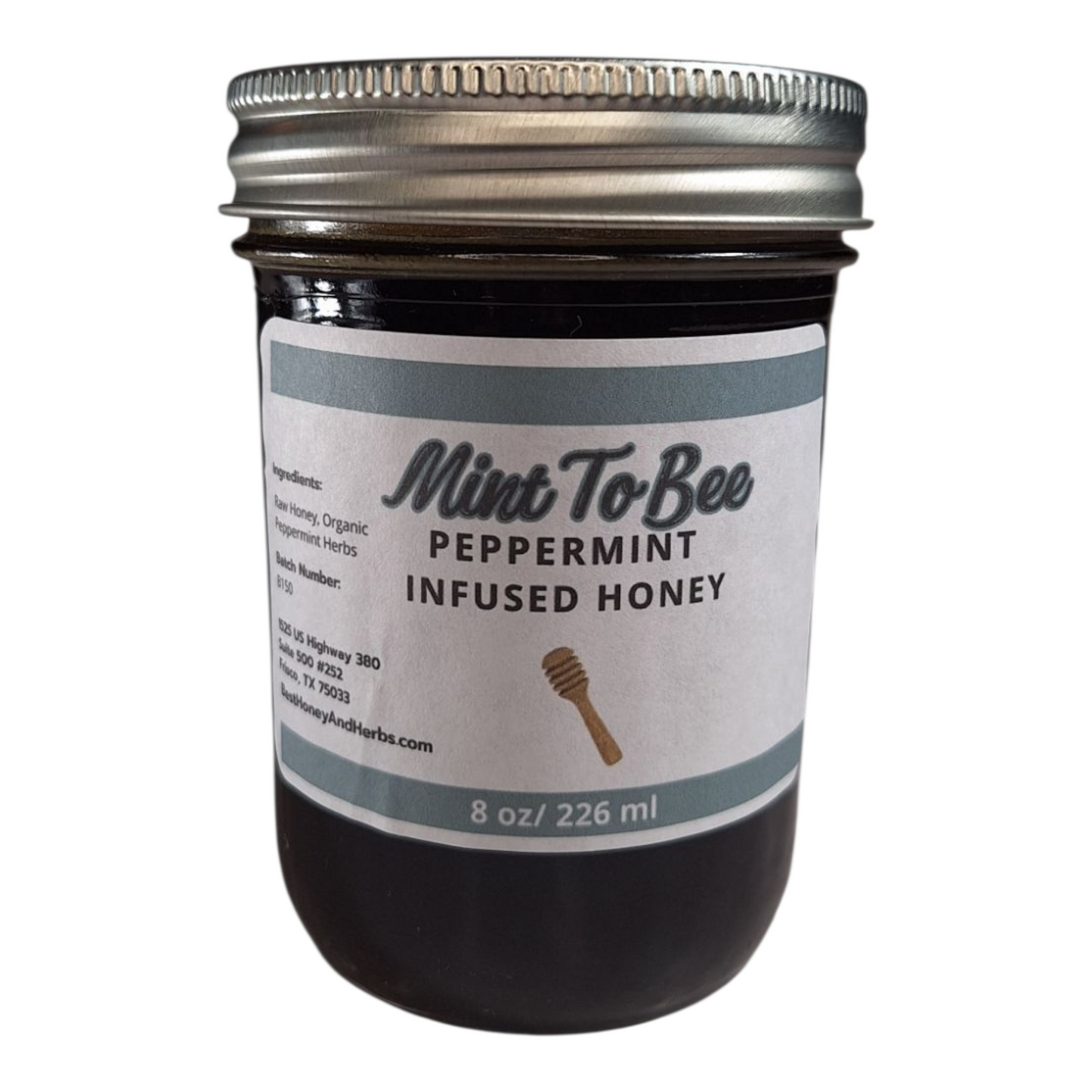 8 oz jar of raw Peppermint Leaf Infused Honey, refreshing herbal sweetener for tea, baking, and holiday treats, on a plain white background.