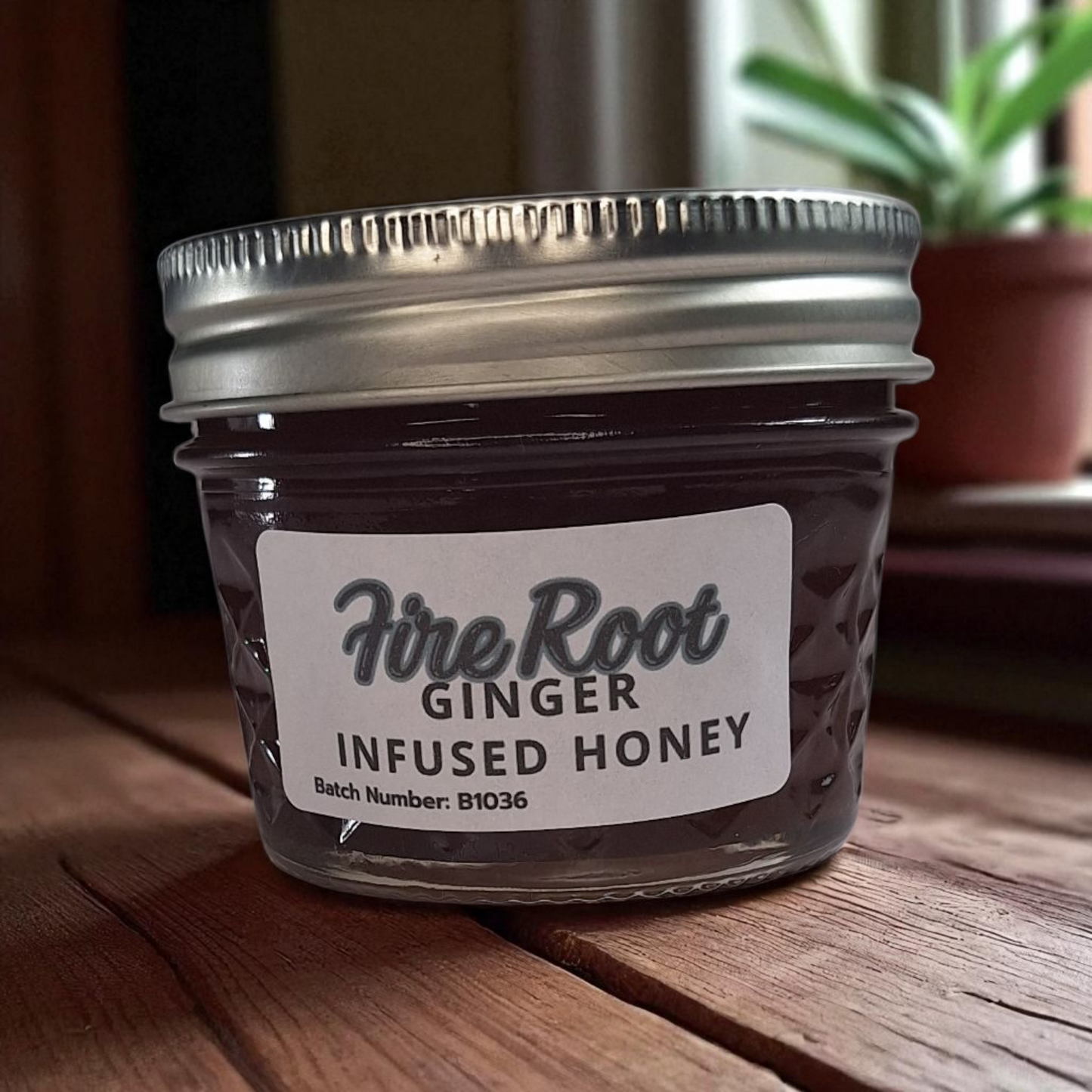4 oz jar of raw Ginger Infused Honey on a rustic wooden surface, zesty herbal sweetener for tea, baking, and immune-boosting recipes.
