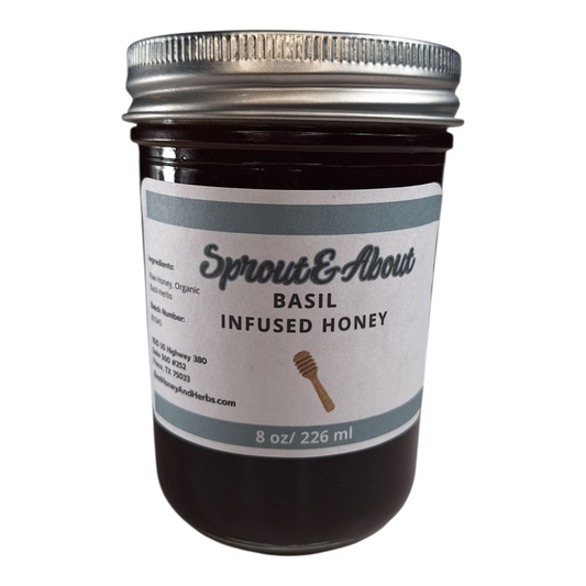8 oz jar of raw Basil Infused Honey, small-batch herbal honey perfect for drizzling on cheese, salads, or bread, on a plain white background.