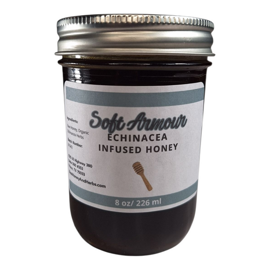 8 oz jar of raw Echinacea Infused Honey, herbal sweetener for tea, immune-support drinks, and healthy recipes, on a plain white background.