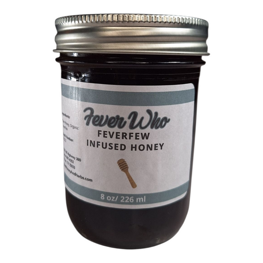 8 oz jar of raw Feverfew Infused Honey, herbal sweetener for tea, baking, and traditional wellness, on a plain white background.