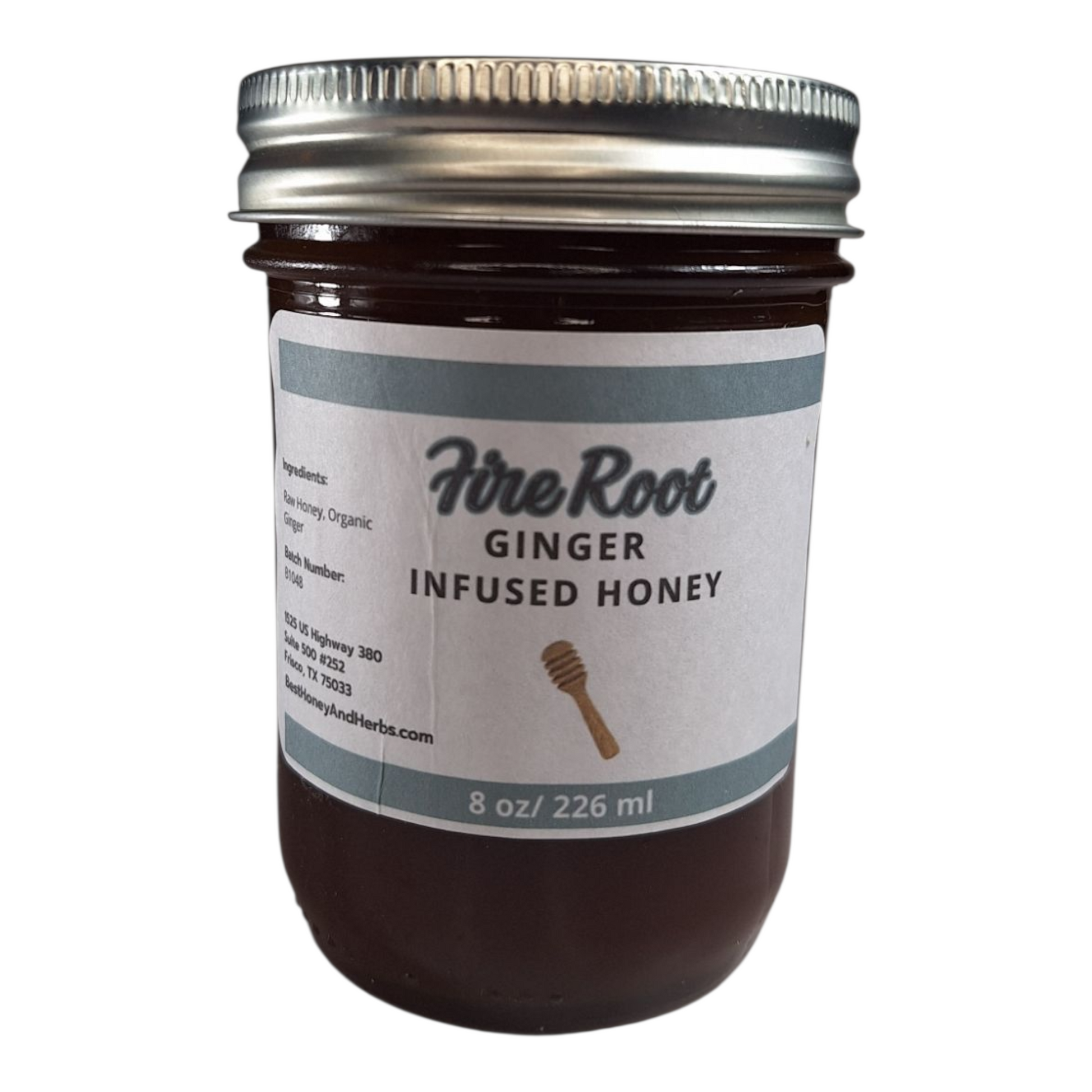 8 oz jar of raw Ginger Infused Honey, zesty herbal sweetener for tea, baking, and immune-boosting recipes, on a plain white background.