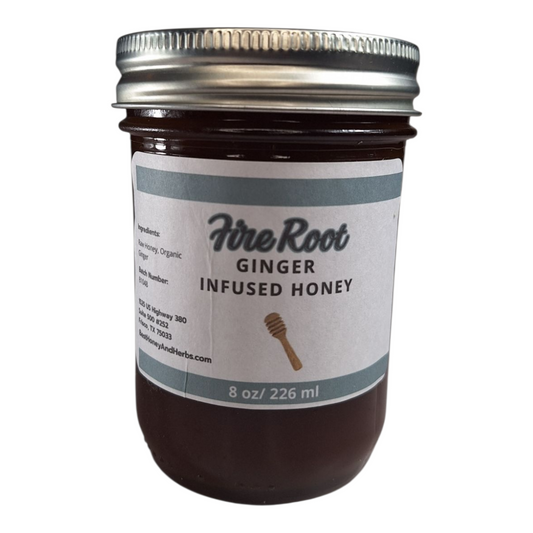 8 oz jar of raw Ginger Infused Honey, zesty herbal sweetener for tea, baking, and immune-boosting recipes, on a plain white background.