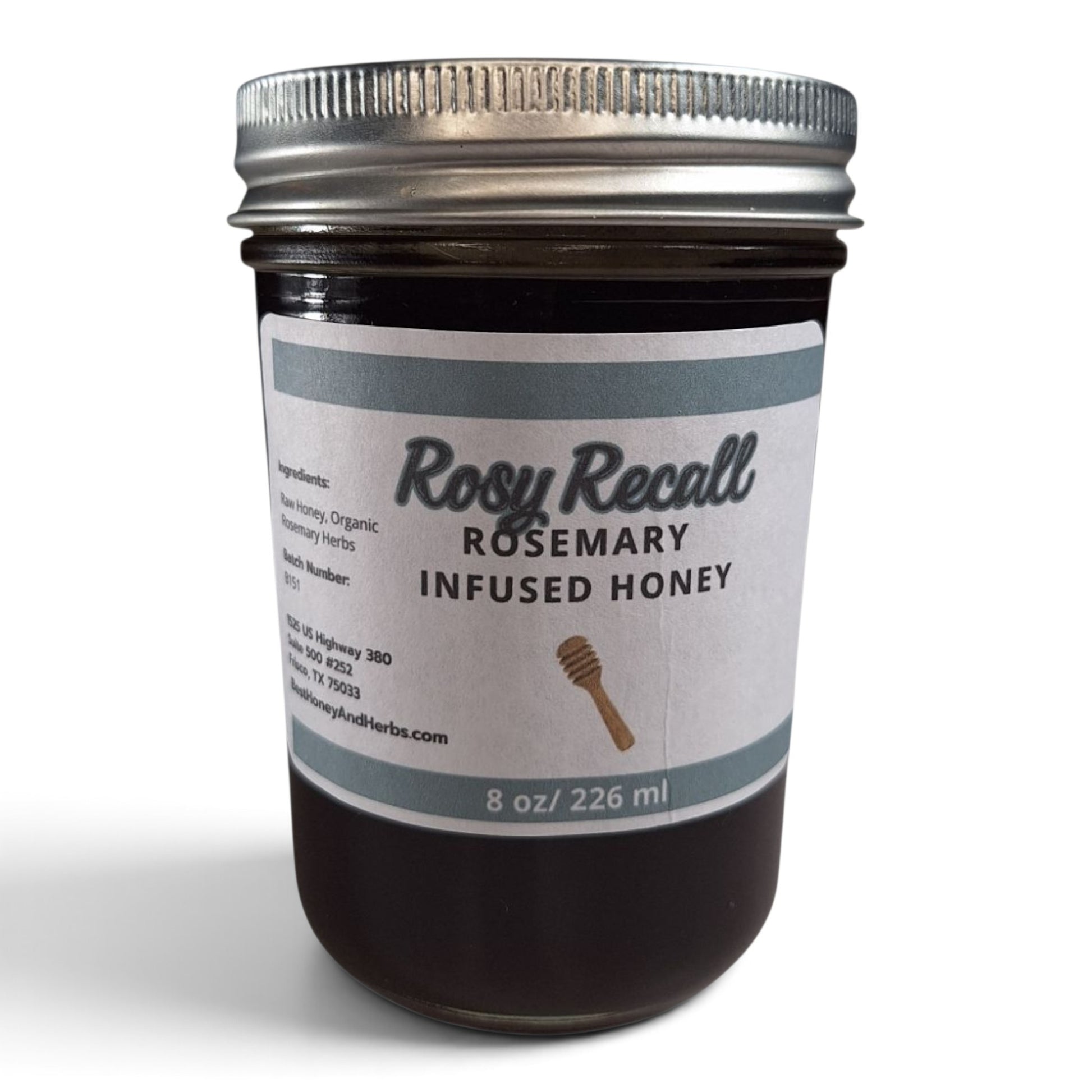 An 8 oz glass jar of Rosemary Infused Honey with a silver metal lid and a white label, set against a plain white background.