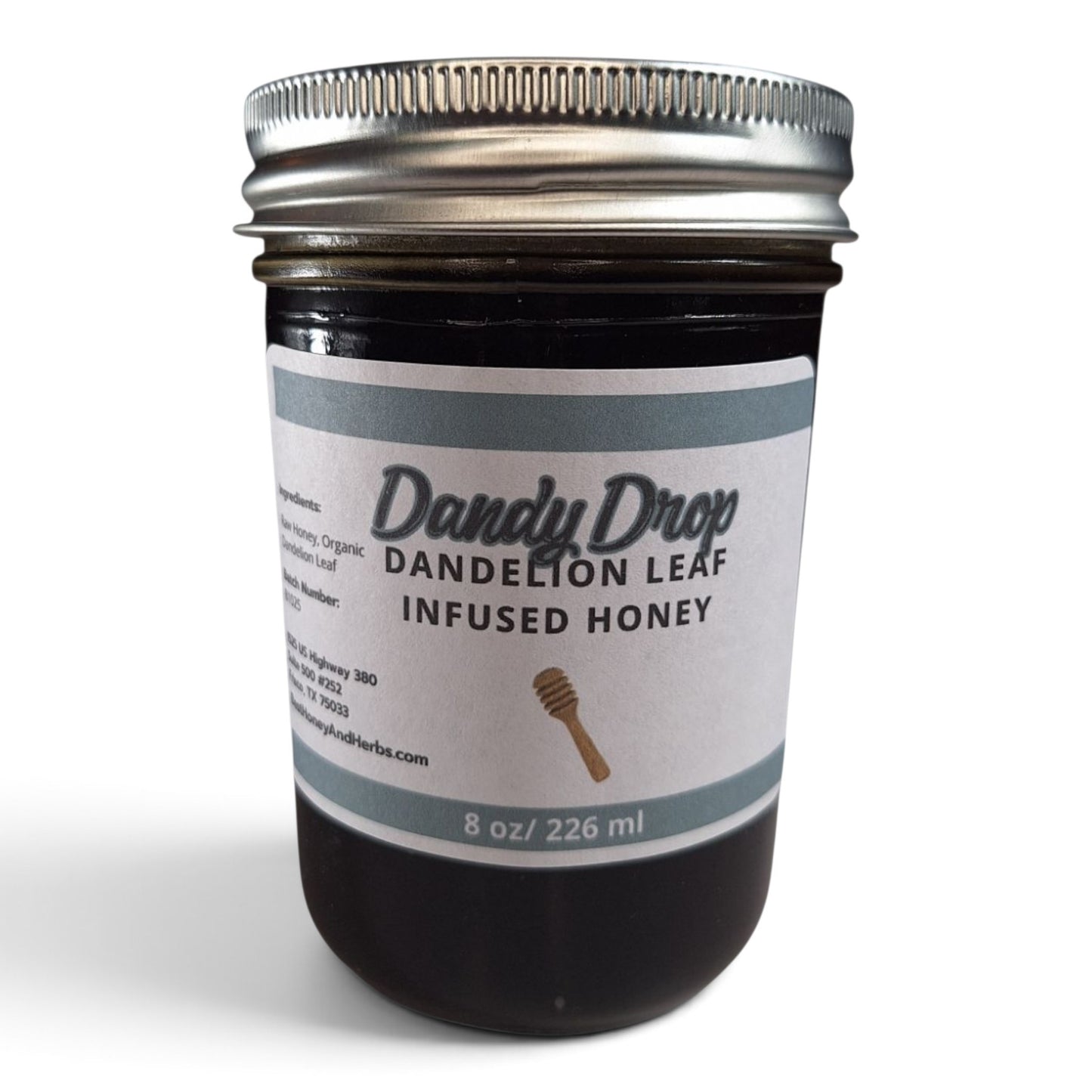 Raw honey infused with organic dandelion leaf in a glass jar with a silver lid.