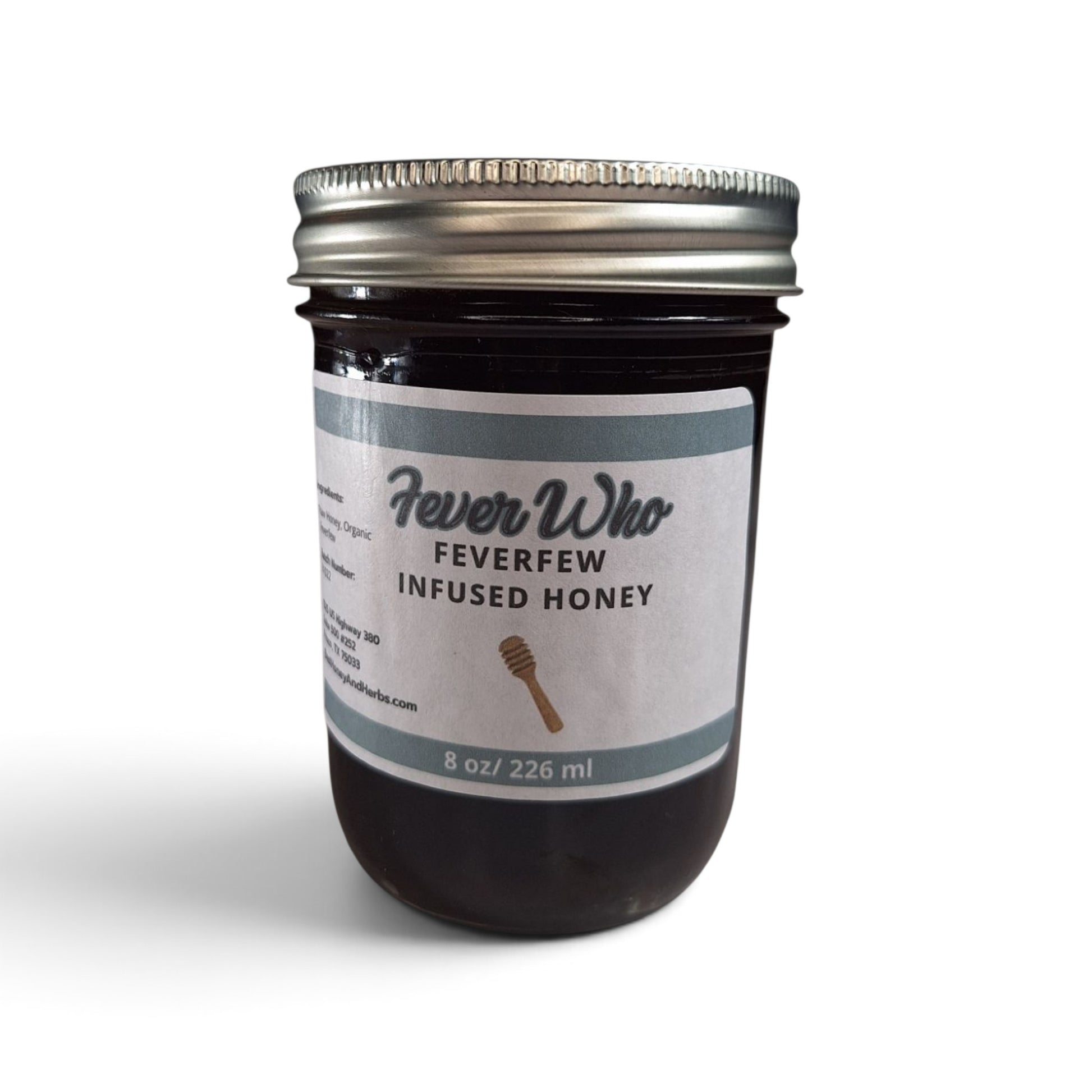  Feverfew infused raw honey in a glass jar with a metal lid and minimalist label.