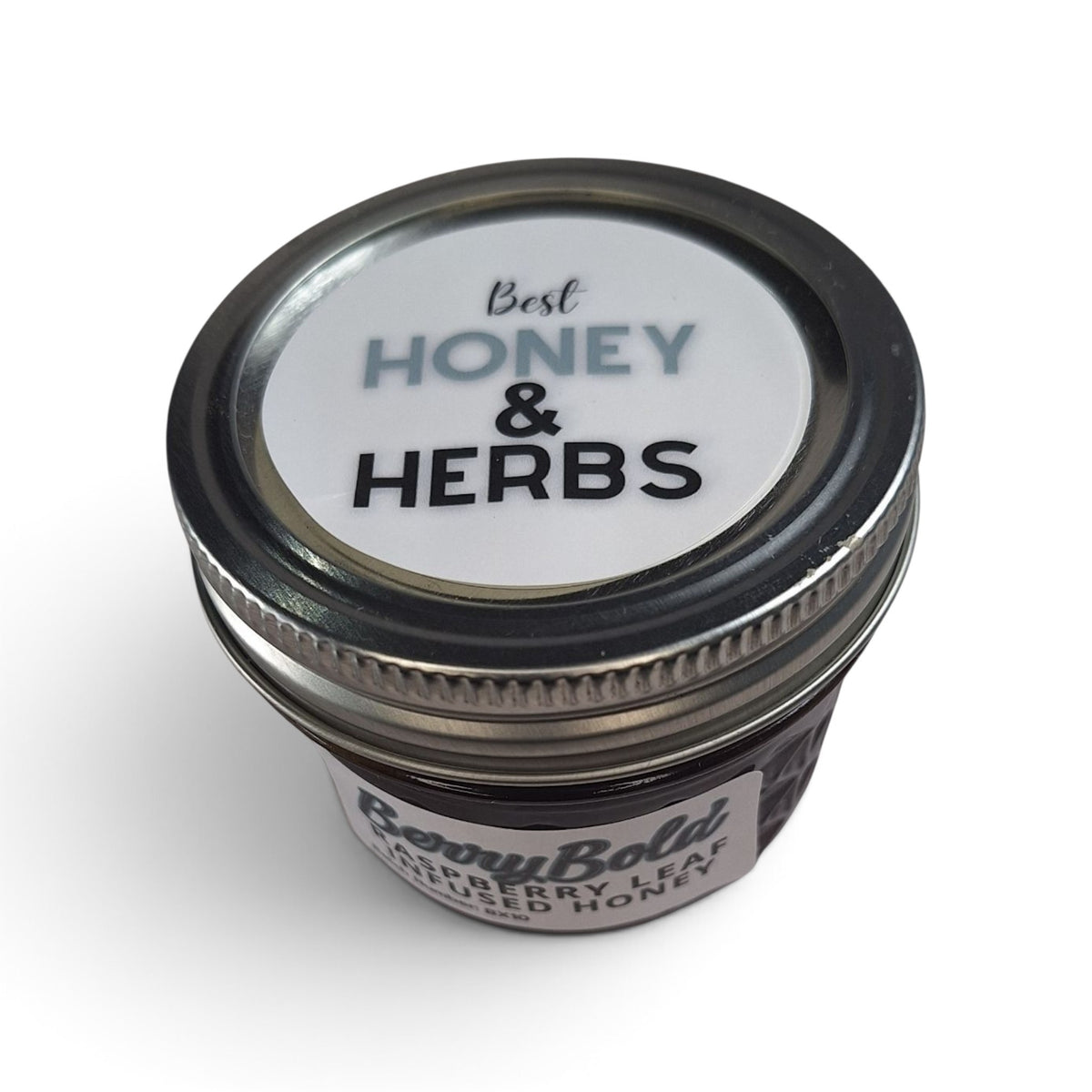 Raw honey infused with organic raspberry leaf in a 4 oz glass jar.