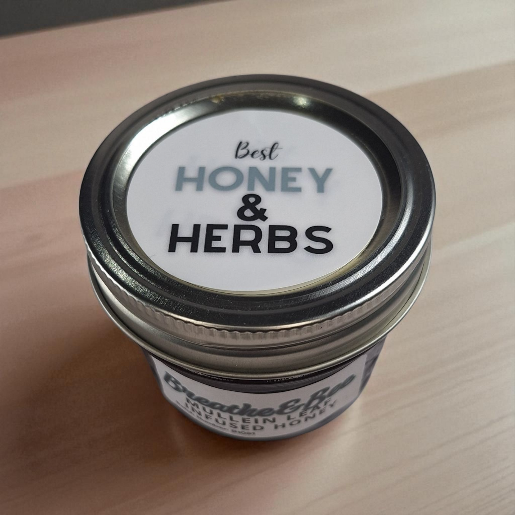 Top-down 4 oz Mullein Leaf Infused Honey on rustic wood; soothing herbal honey for warm tea and simple dressings.